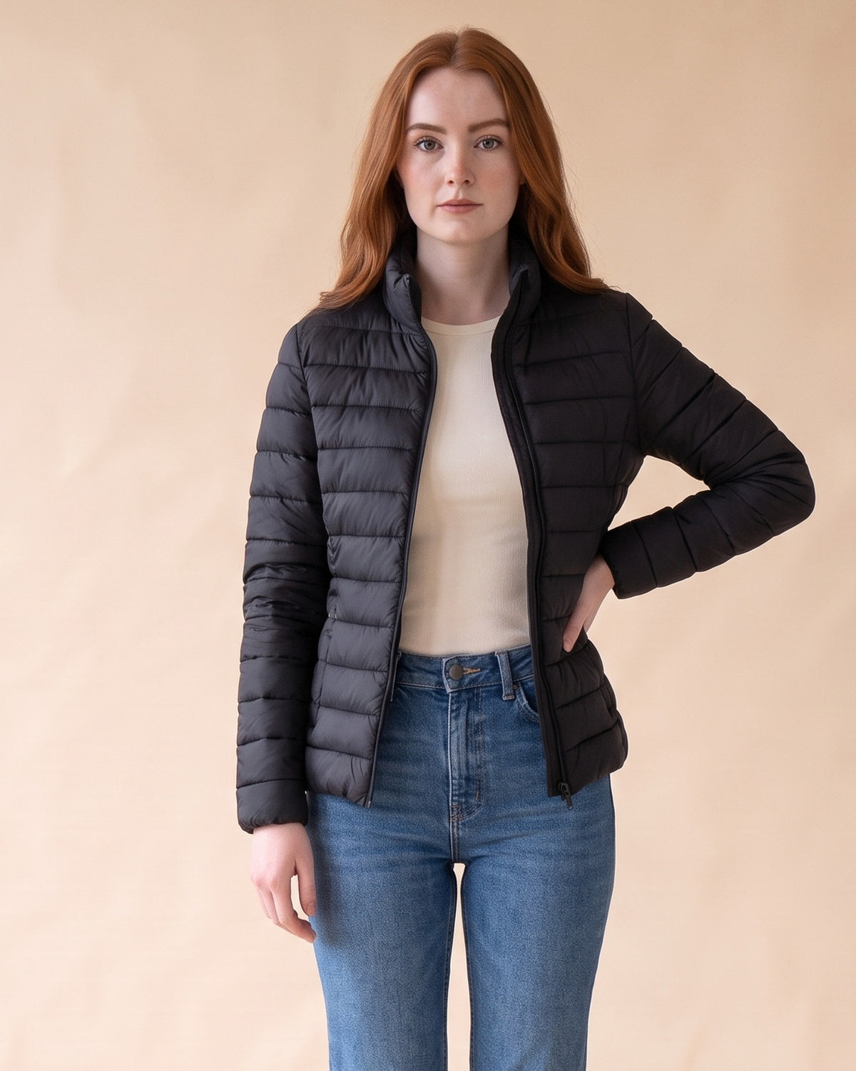 Lightweight Puffer Jacket in Black, front view on model