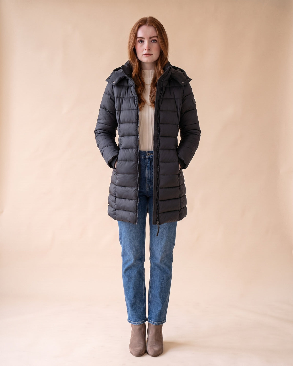 Long Quilted Puffer in Black, full-length front view on model
