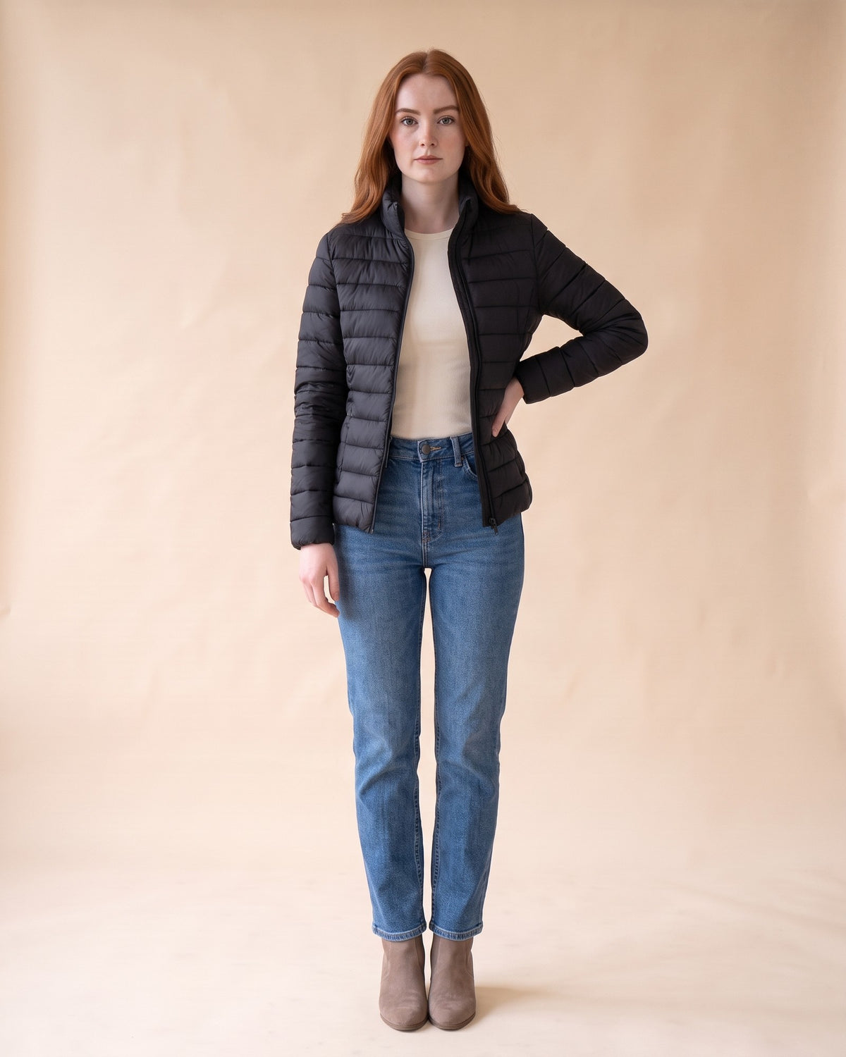 Lightweight Puffer Jacket in Black, full-length front view on model