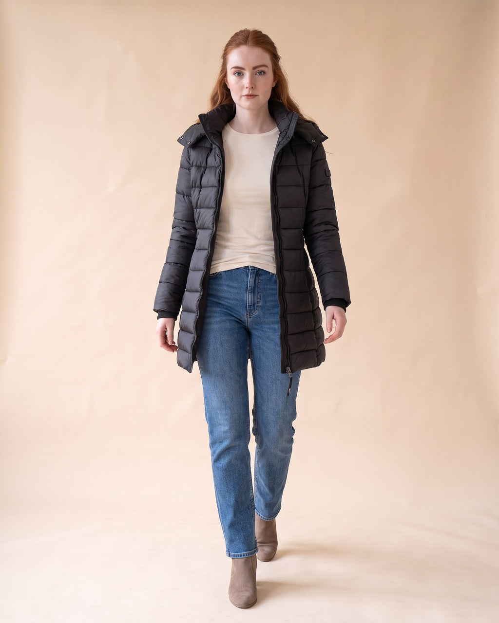 Long Quilted Puffer in Black, styled full-length view on model