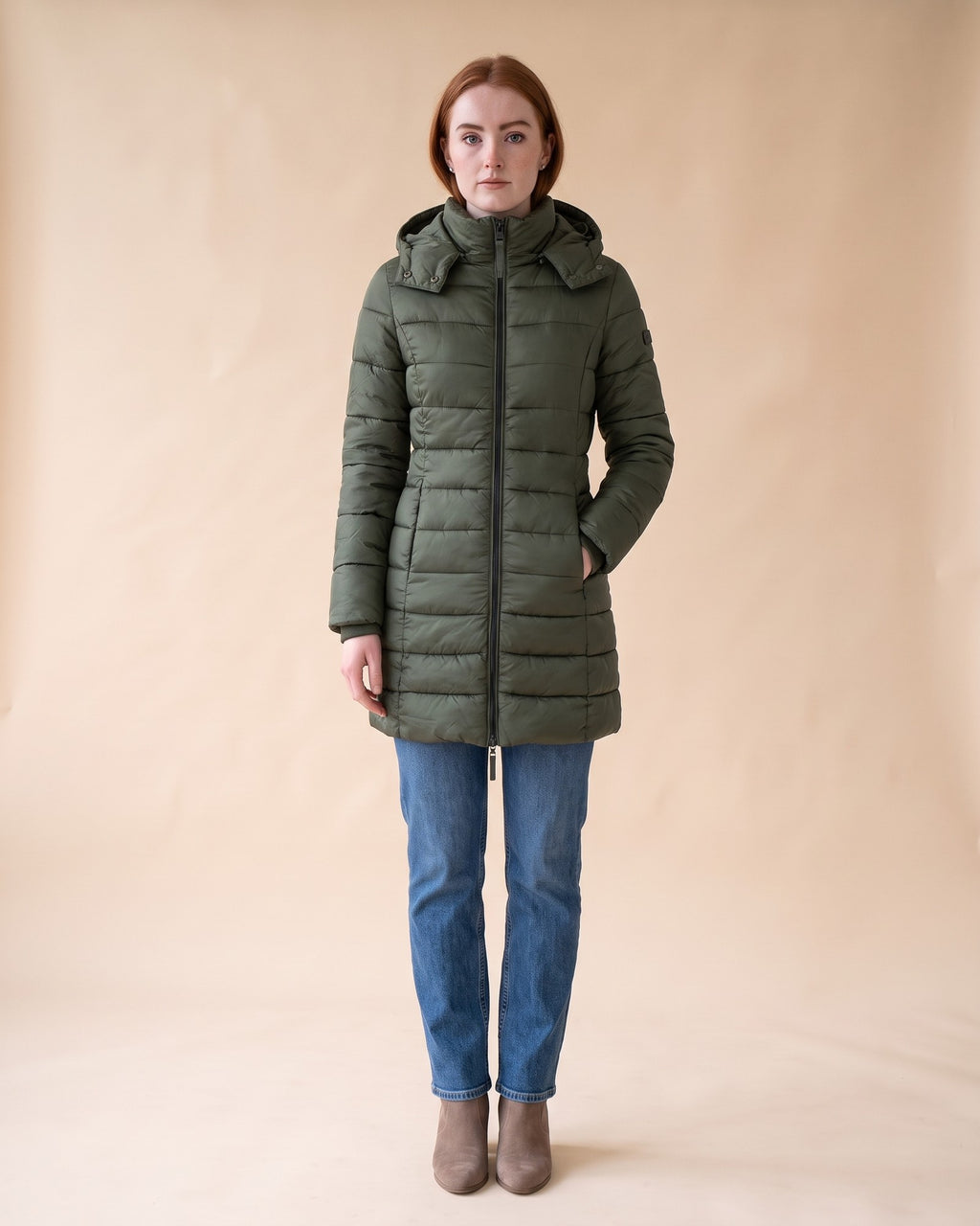 Long Quilted Puffer in Green, full-length front view on model