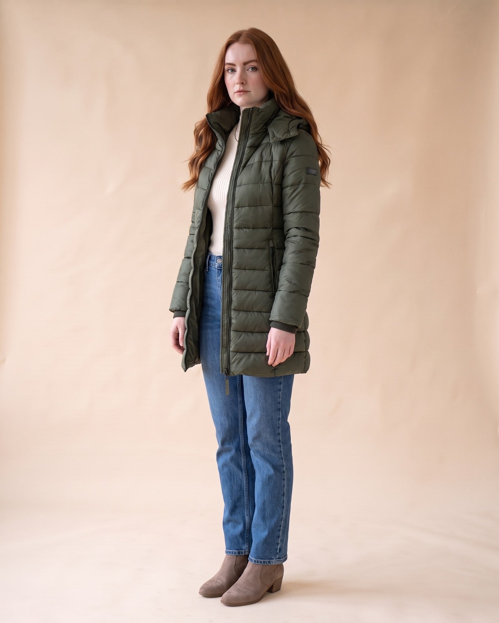 Long Quilted Puffer in Green, styled full-length view on model
