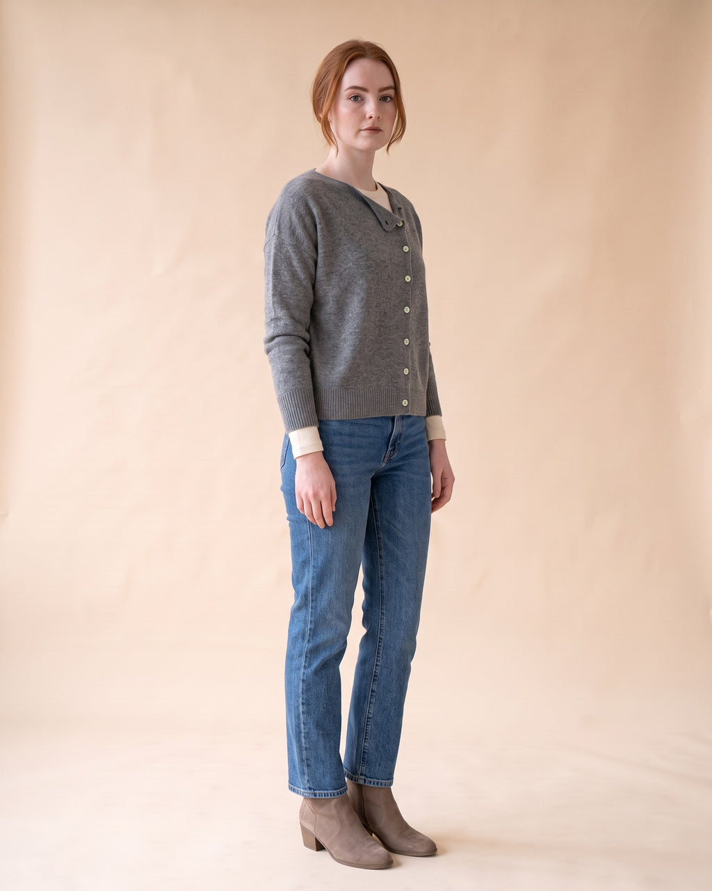 Asymmetric V-Neck Cardigan in Grey, full-length side view on model