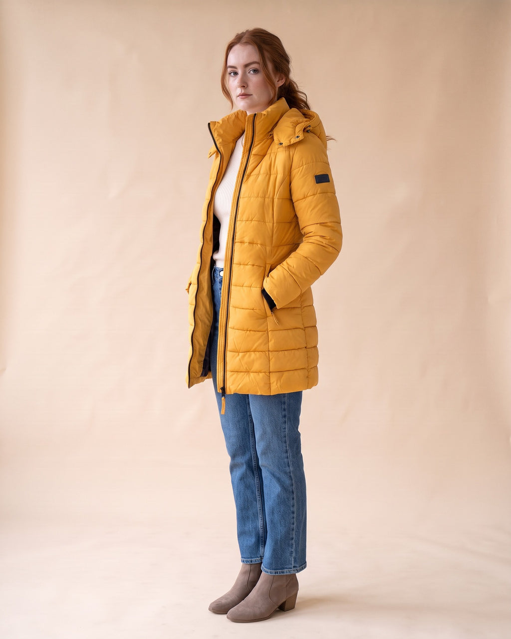 Long Quilted Puffer in Yellow, styled full-length view on model