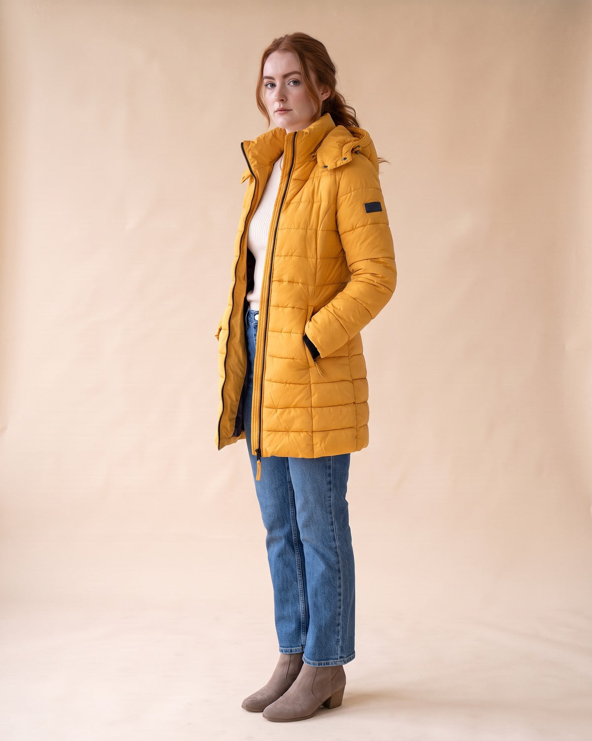 Long Quilted Puffer in Yellow, styled full-length view on model